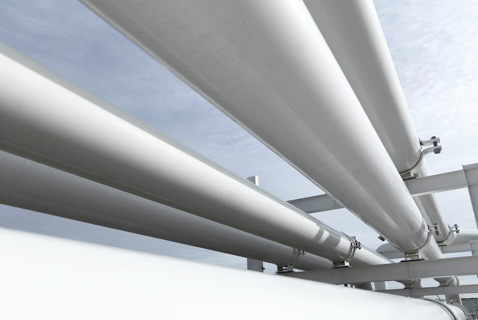 White pipes at tank terminal